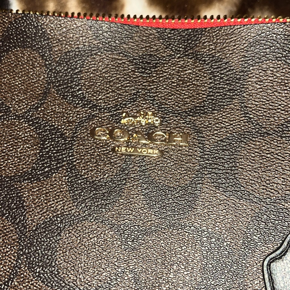 Dark brown and red coach bag